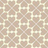 seamless pattern featuring hearts with a vibrant plaid texture, arranged in a playful, geometric design. Perfect for fabric, gift wrap, or home decor projects that need a touch of whimsy and vector