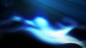 A mesmerizing display of blue glowing particle waves, representing abstract energy flows against a dark background video