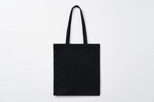 Empty fabric shopping bag on white background photo