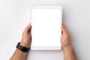 Digital tablet computer close up, man using tablet with hands photo