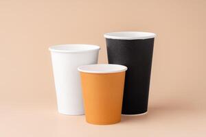 Paper cups stacked on a neutral background for a visually appealing display photo