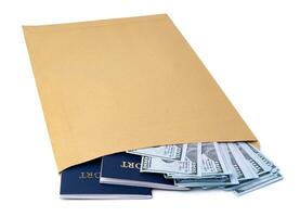 new mail envelope with dollars inside isolated on white background. photo