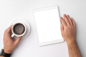 Digital tablet computer close up, man using tablet with hands photo
