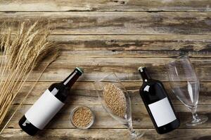 A bottle of beer and grain. Top view. Free space for text. photo