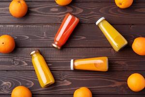 Fresh orange juice in the glass with orange fruit on wooden background photo