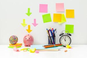Work place of a creative person with a variety of colorful stationery objects photo