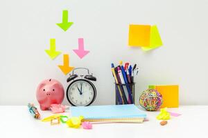 Work place of a creative person with a variety of colorful stationery objects photo