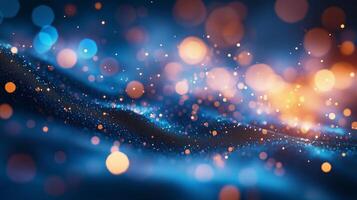 Soft glowing particles dance across a blue canvas in a mesmerizing abstract display of light and color photo