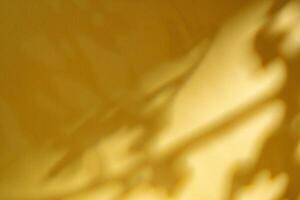 Abstract shadow from the window on yellow background photo