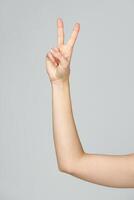 Young Woman Arm with Gesture close up photo