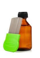 Cosmetic products and lice comb isolated on white background photo