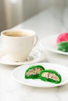 Multi-colored Japanese cakes Mochi in a white plate photo