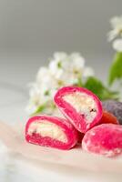 Multi-colored Japanese cakes Mochi in a white plate photo