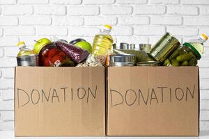 Donation box with various food. Pandemic support. photo