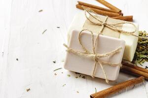 handmade soap with cinnamon on the table photo