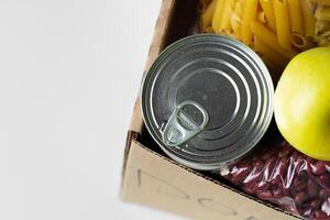 Donation box with various food. Pandemic support. photo