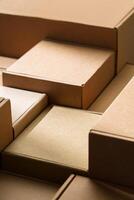 Stacked cardboard boxes arranged in a neat pattern under natural light photo
