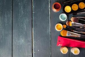 Makeup brushes and make-up eye shadows photo
