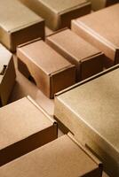 Multiple cardboard boxes arranged on a surface for packaging and shipping in a warehouse setting photo