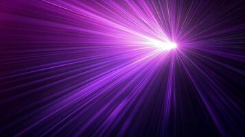 Vibrant purple light beams radiating from a central point in a dark space, creating a mesmerizing visual effect at night photo