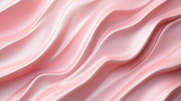Soft pink satin fabric draping elegantly with gentle waves, capturing light and texture in a delicate pattern photo