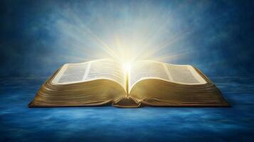An open book emits a radiant glow against a blue background, symbolizing knowledge and enlightenment in a serene setting photo