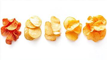 Variety of different potato chips arranged on a white surface, showcasing unique textures and colors in a delightful snack display photo