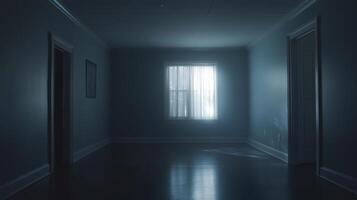 Empty dimly lit room with a solitary window casting soft light in a quiet atmosphere during the evening photo