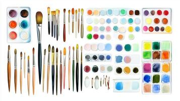 A colorful arrangement of various watercolors and brushes on a white background, ideal for artistic projects and creative expression photo