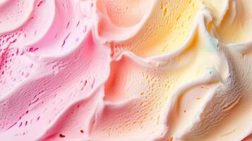 Delicious swirls of pastel pink, orange, and yellow ice cream create a tempting dessert display in a close-up view photo