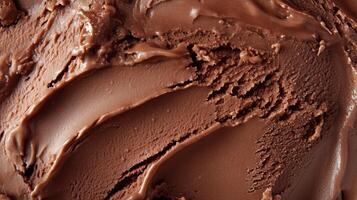 Rich chocolate ice cream texture displayed in a close-up view, inviting indulgence and sweetness in every scoop photo