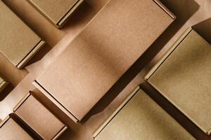 Multiple cardboard boxes arranged on a surface for packaging and shipping in a warehouse setting photo