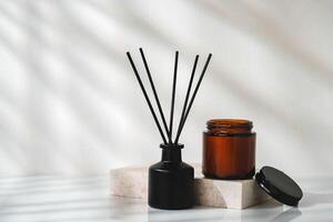 Elegant Aroma Diffuser With Black Reeds on a Marble Stand in Soft Daylight photo