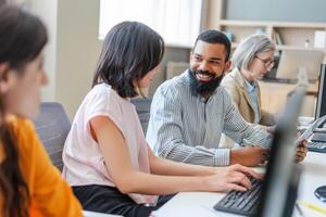 Diverse team of programmers working on computers in modern office photo