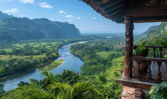 A panoramic view of a winding river through a lush valley, seen from a balcony of a highland retreat photo
