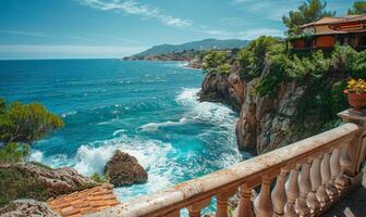 A picturesque seaside cliff with waves crashing against the rocks, viewed from a balcony with Mediterranean style photo