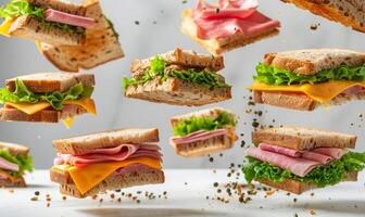 A selection of sandwiches with different fillings like ham, cheese, and lettuce flying in mid-air with a white background photo