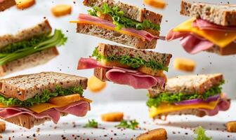 A selection of sandwiches with different fillings like ham, cheese, and lettuce flying in mid-air with a white background photo