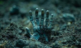A skeleton hand emerging from the ground in a dark cemetery, with open space at the top for a message photo