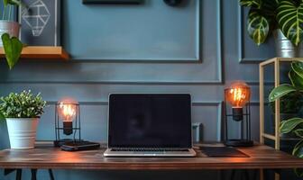 A stylish home office setup with a blank screen laptop and modern decor photo