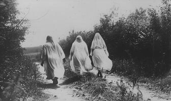 A vintage black-and-white Halloween photo with ghostly figures, leaving plenty of space on the right for a message