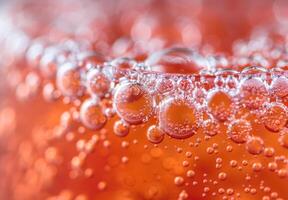 Close-up shot of the bubbly texture of a carbonated soda photo