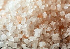 Extreme close up of the granular texture of sea salt crystals photo