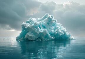 Iceberg floating in the ocean with clouds in the background photo