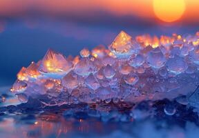 Ice crystals on the water at sunset photo