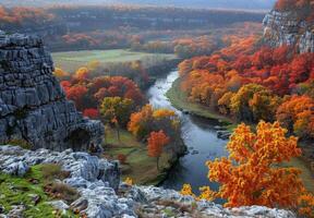 Autumn colors in the mountains near a river photo
