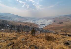 A view of a fire in the mountains photo