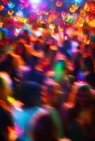 A blurry image of people dancing at a party photo