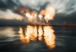 Fireworks in the sky over water photo