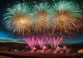 Colorful fireworks lighting up the sky with large bursts, silhouetting a cheering crowd below photo